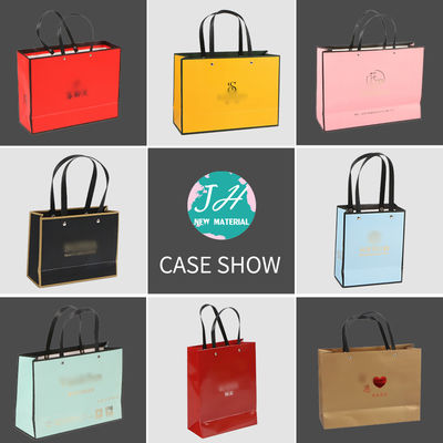 Embossing PMS Color Paper Take Out Bags With Handles , Luxury Carrier Bags